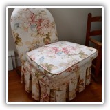 F48. Upholsered child-sized rocking chair. 26.5"h - $65