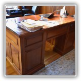 F27. Cherry executive desk.  31"h x 59.5"w x 30"d - $350