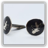 J12. Sterling and enamel cufflinks marked Siam - $16