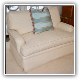 F11. Cream colored loveseat. 34"h x 52"w x 39"d - $425