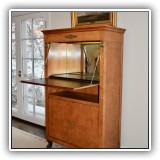 F16. Baker Furniture Collector's Edition burlwood neoclassical bar. 65"h x 37.5"w x 18"d - $1,850