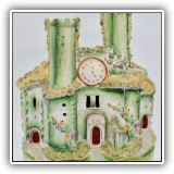 P08. Staffordshire house with clock vase. 8"h x 7"w - $58