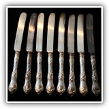 S06. Set of 8 stering handle knives. Monogrammed "EAP." - $120