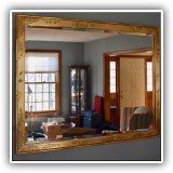 D32. Asian-inspired painted gold beveled mirror. 34"h x 44"w - $350
