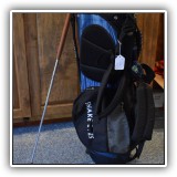 L12. Snake eyes golf bag and putter. - $35