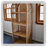 F34. Wicker shelves. 67"h x 26.5"w x 14.5"d - $85