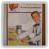 A29. Coca Cola Ad with copper frame. 9.75"h x 6.5"w - $12