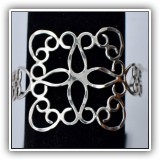 J05. Silver scrollwork bracelet. - $14