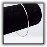 J26. Thin silver bangle. - $6