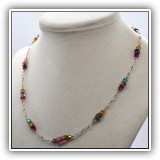 J40. Silver and glass bead necklace. - $12