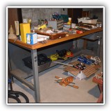 F88. Metal worklbench with wood top. 34"h x 72"w x 36"d - $125
