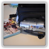 E12. Sony Handycam with bag and accessories. - $125