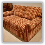 F57. Rowe Furniture loveseat with striped uphostery. 31"h x 60"w x 39"d - $350
