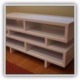 F78. Tiered geometric console table 24&h x 47"w x 16"d