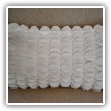D45. Four ivory linen pillows with scalloped decoration. 18" x 10" - $12 each.