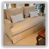 F03a. One of a pair of Tomlinson Irwin-Lambeth sofas.  Cat damage at back corners. 35.5"h x 68"w x 38"d - $250 each.