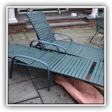 L05. 2 Lounge chairs. One with missing strap. - $60 for the pair.