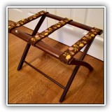 D96. Folding luggage stand