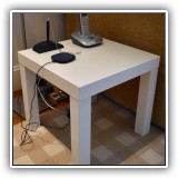 F29. White plastic side table. 15"h x 17"w x 17"d - $15