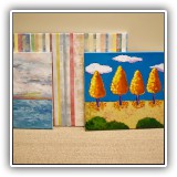 A51. Unframed paintings on canvas