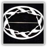 J30. Signed oval silvertone pin with border of birds. 2" x 1.75" - $14