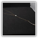J35. April Soderstrom goldtone and stone drop necklace