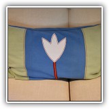 D56. Felt pillow with tulip design. - $18